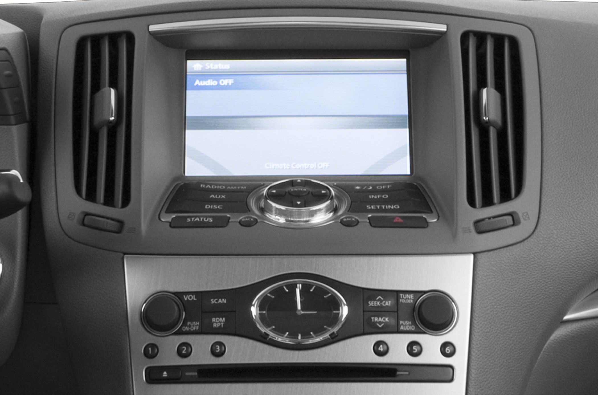 Center console with multimedia screen and analog clock