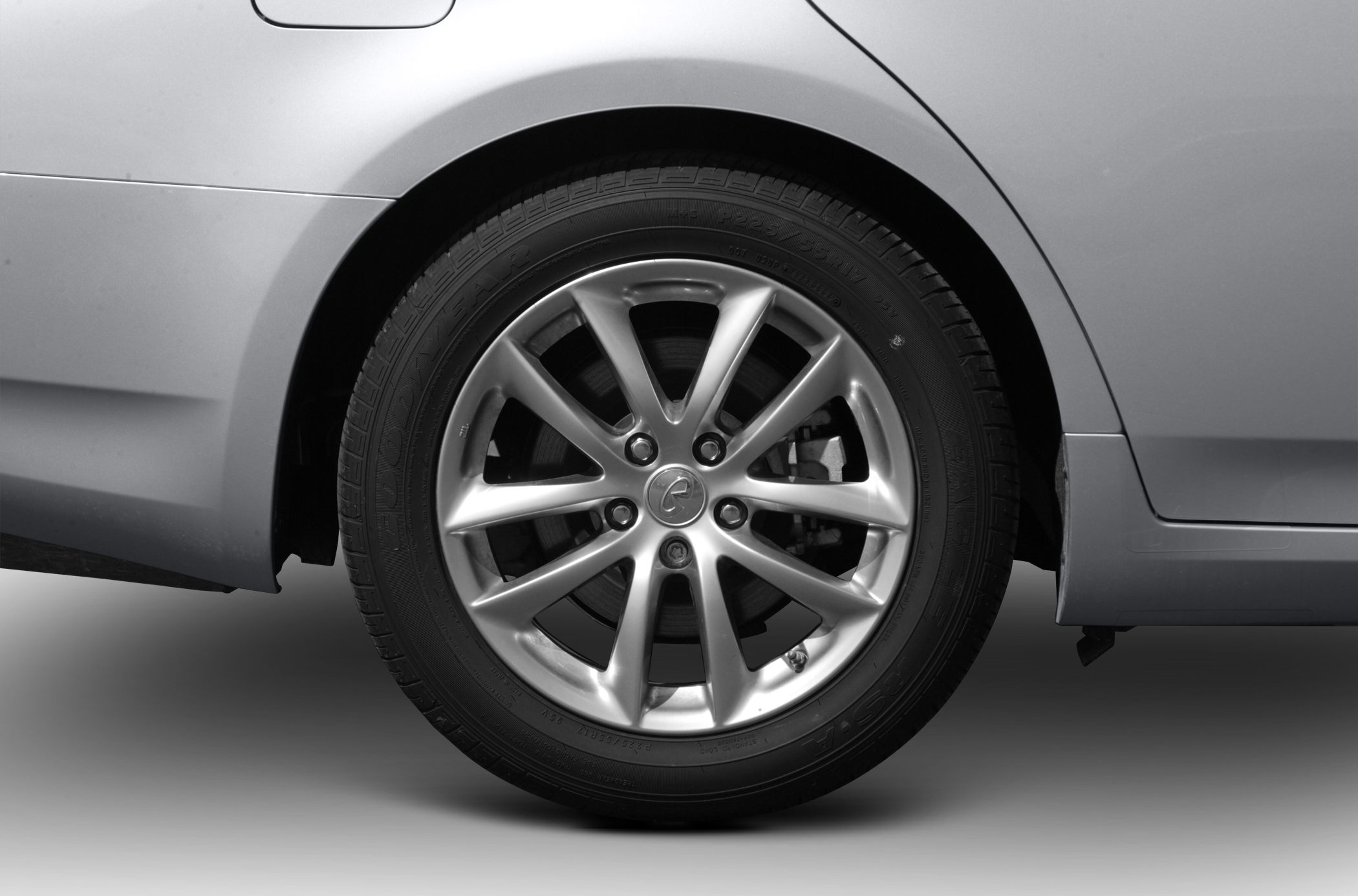 Alloy wheel and rear fender close-up with multi-spoke rim design