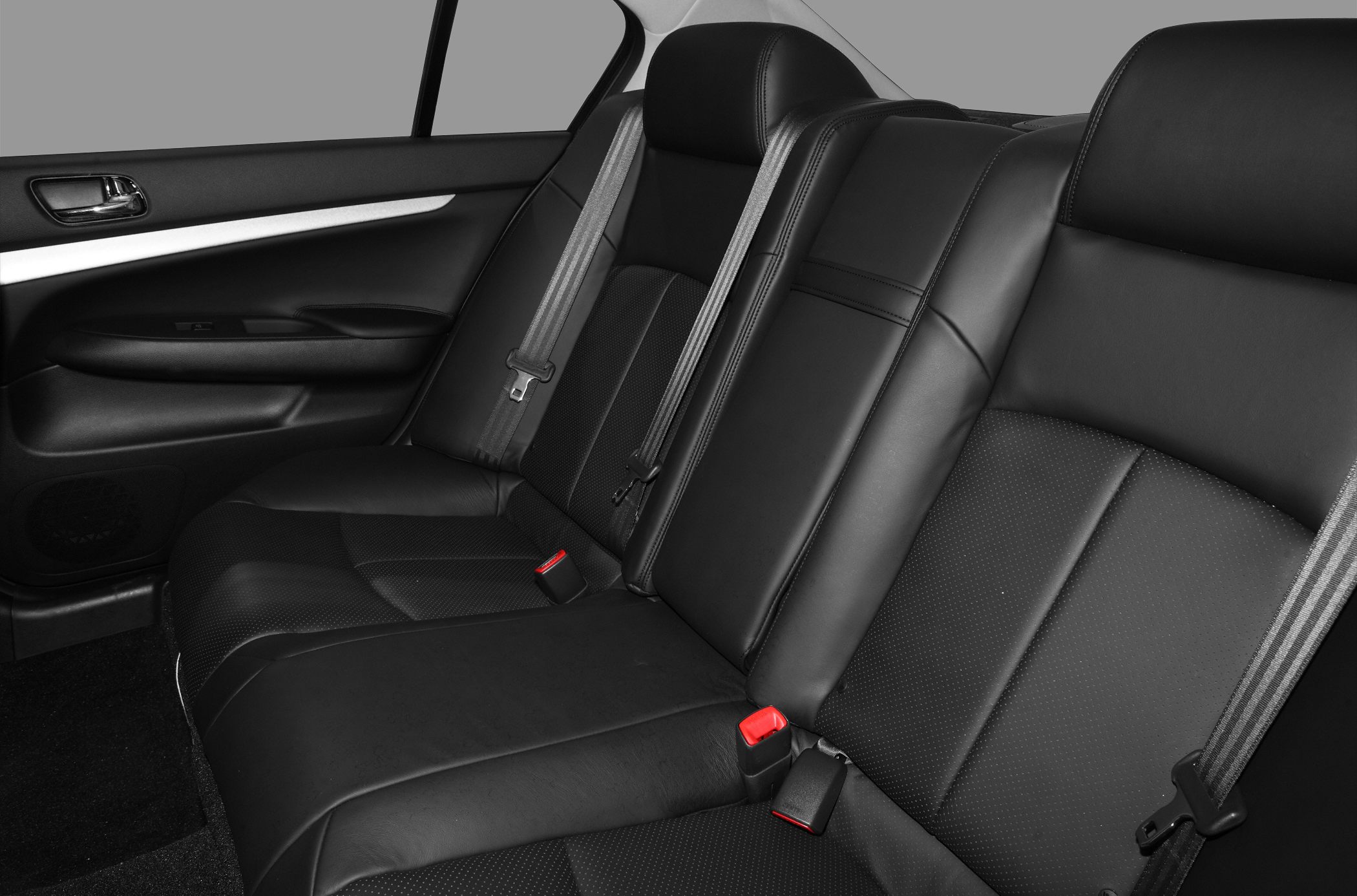 Rear black leather seats with seat belts and door panel