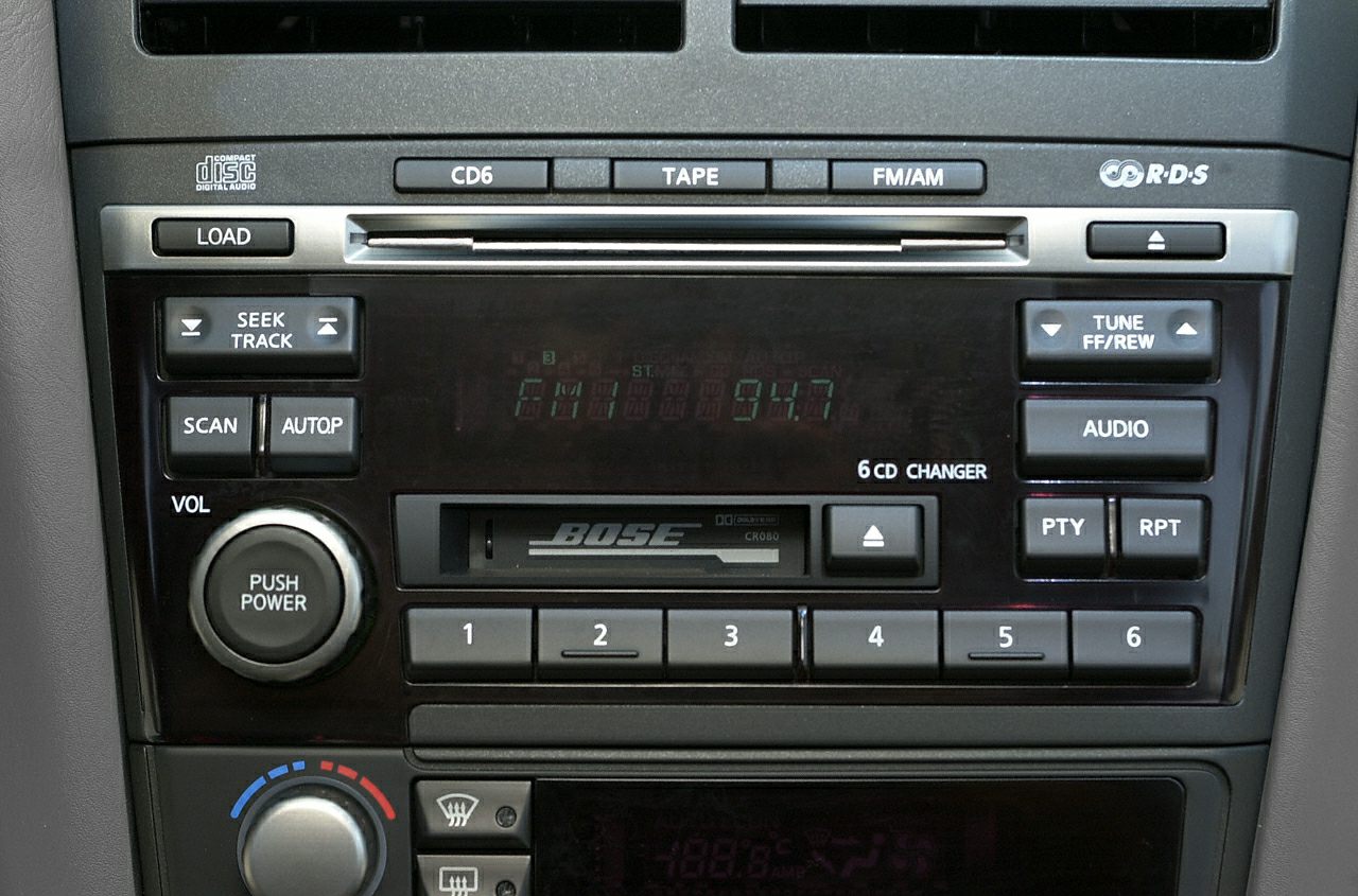 Bose 6-CD changer, cassette player, FM/AM radio controls, volume and tuning buttons