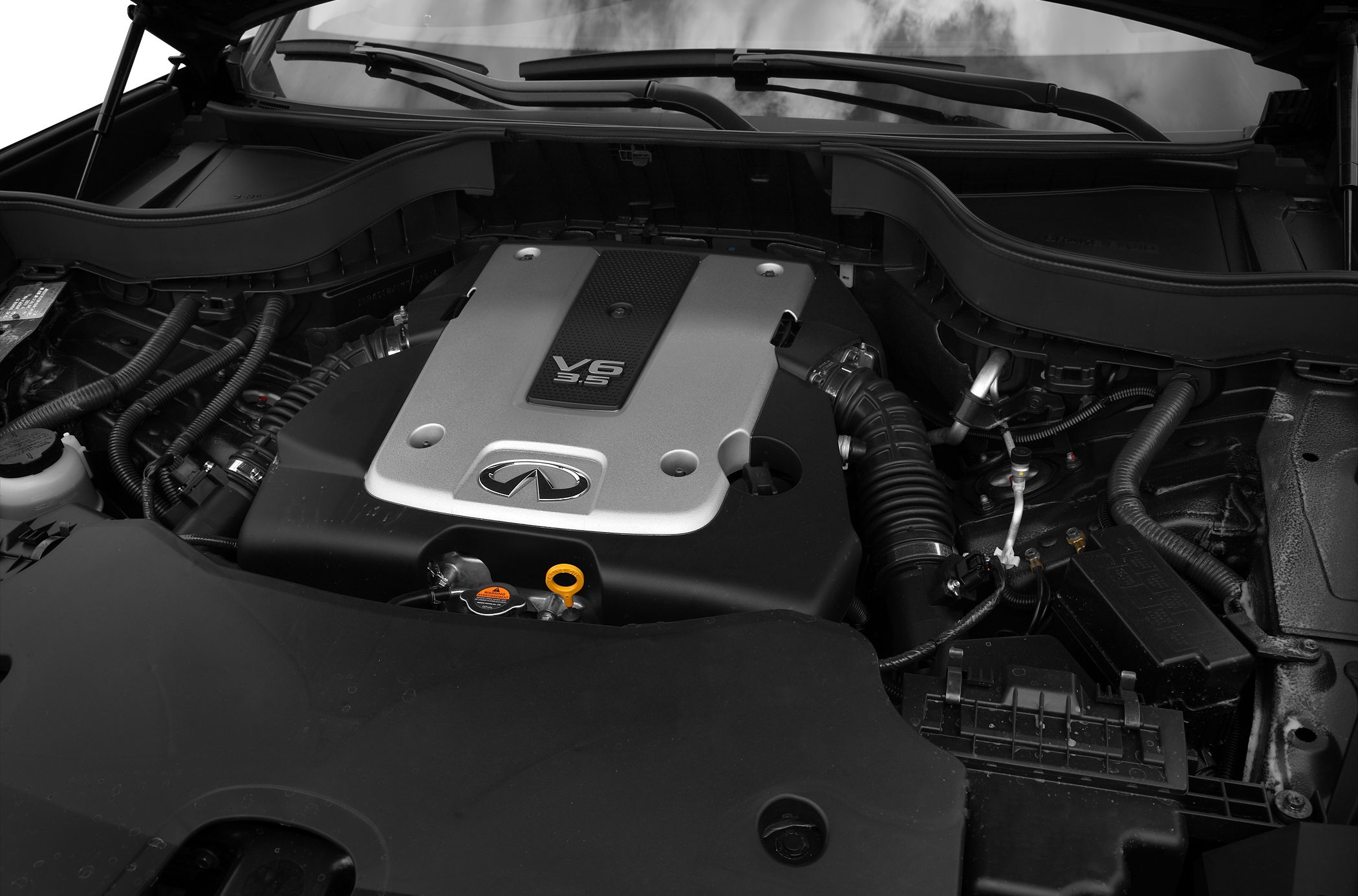Detailed 3.5L V6 engine with visible components and engine cover