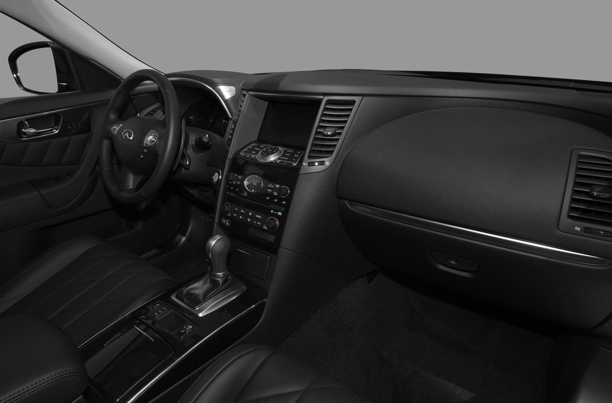 Interior dashboard and steering wheel with center console and gear shift