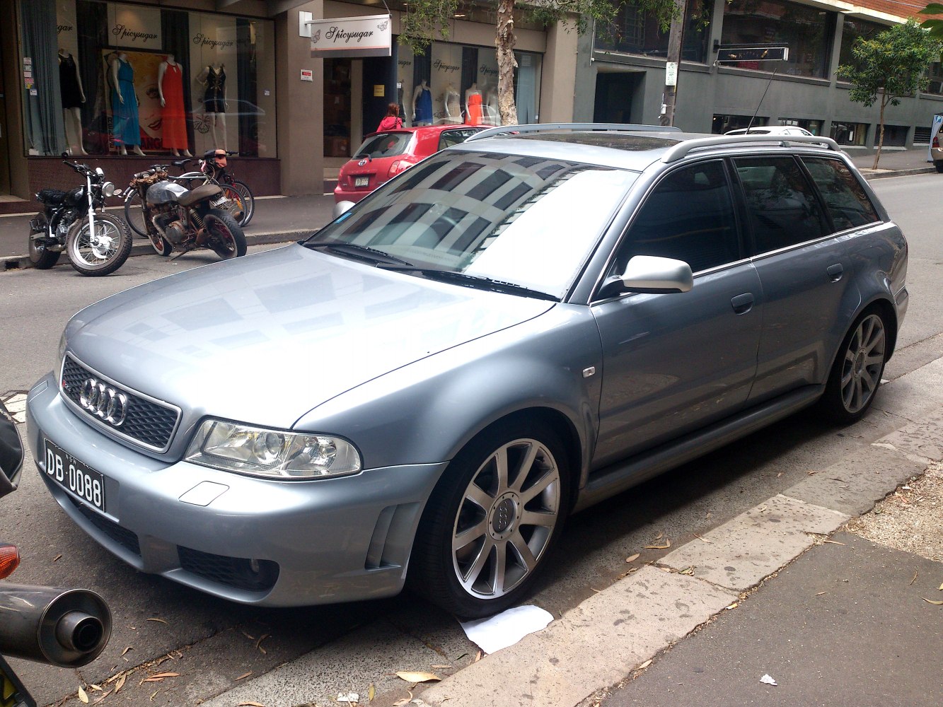 Silver sporty wagon with distinctive aggressive front fascia and alloy wheels