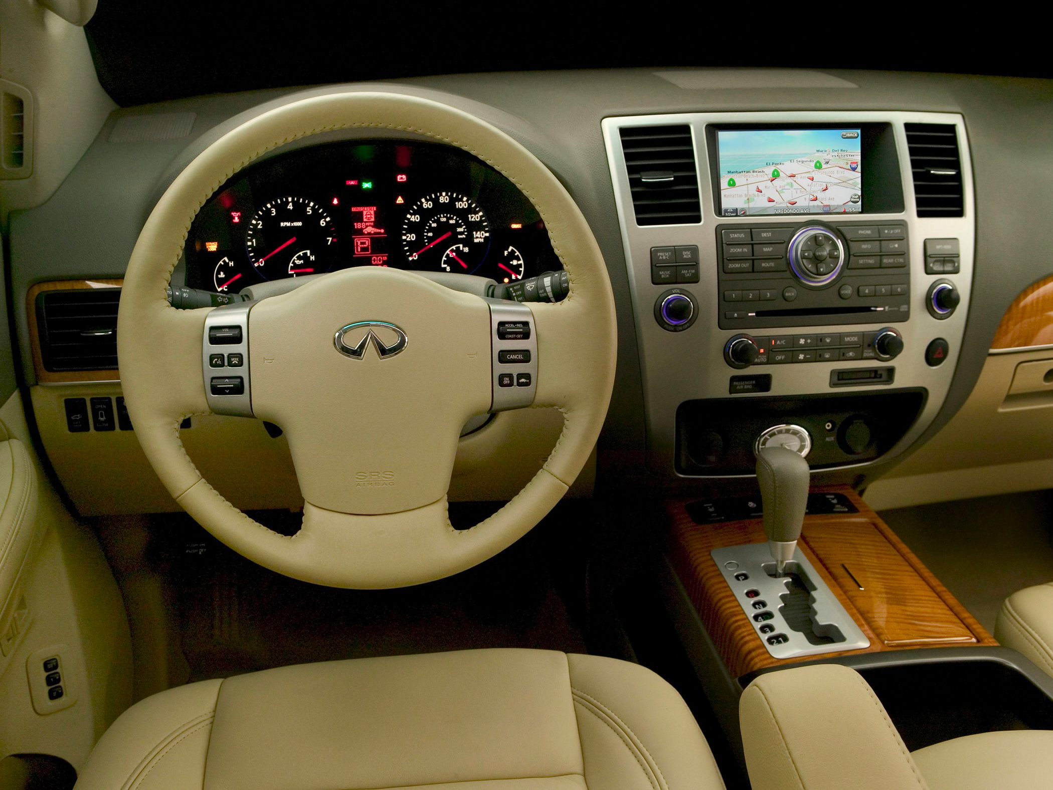 Beige leather interior with dashboard and navigation system