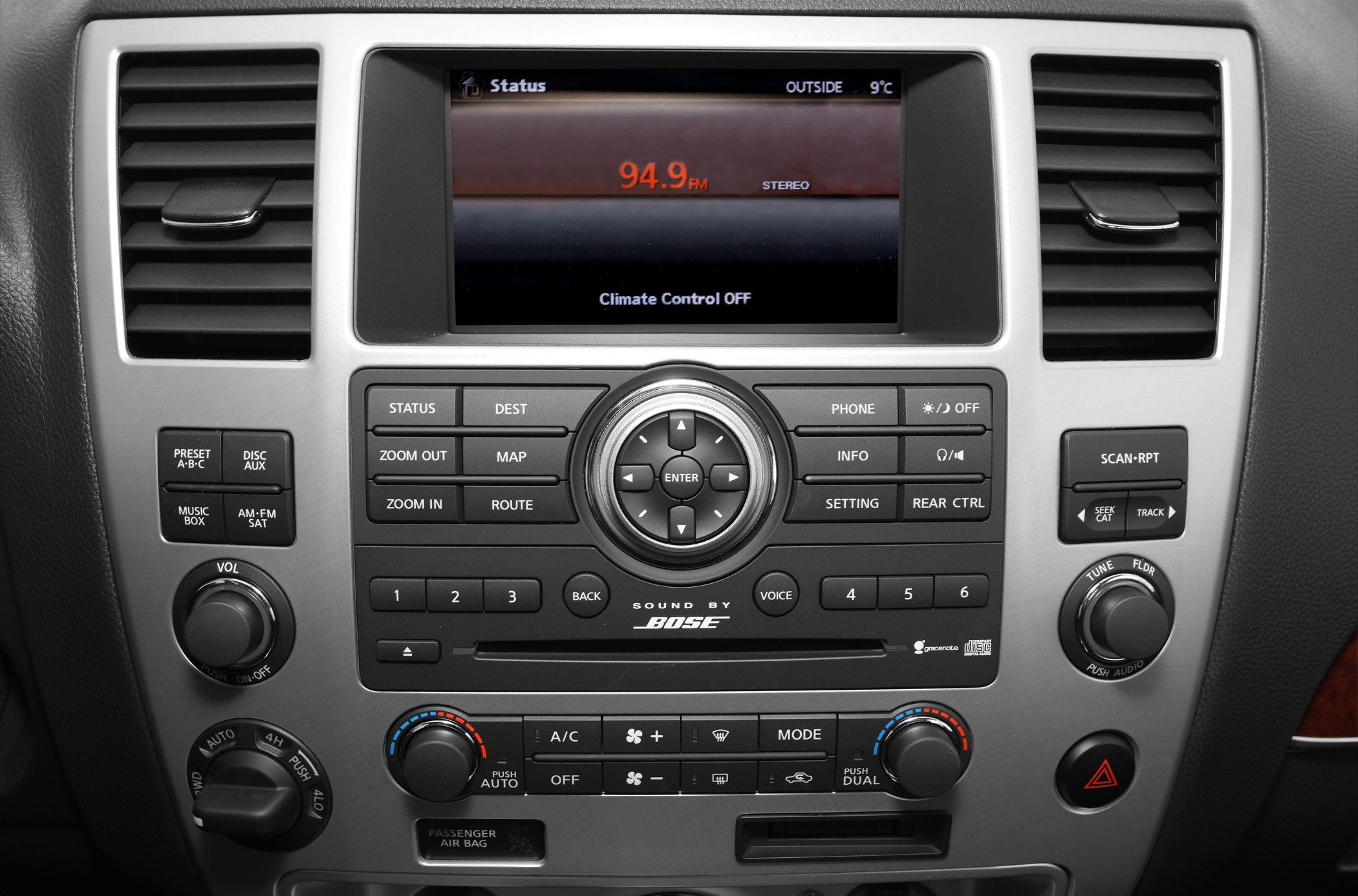 Infotainment screen and control panel with Bose sound and climate controls