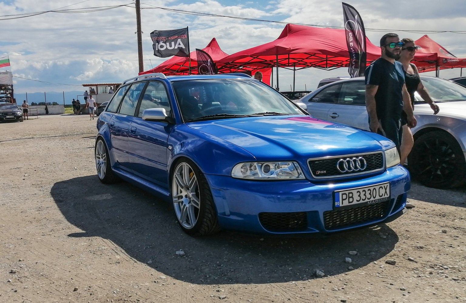 Blue Audi RS4 Avant front view with alloy wheels