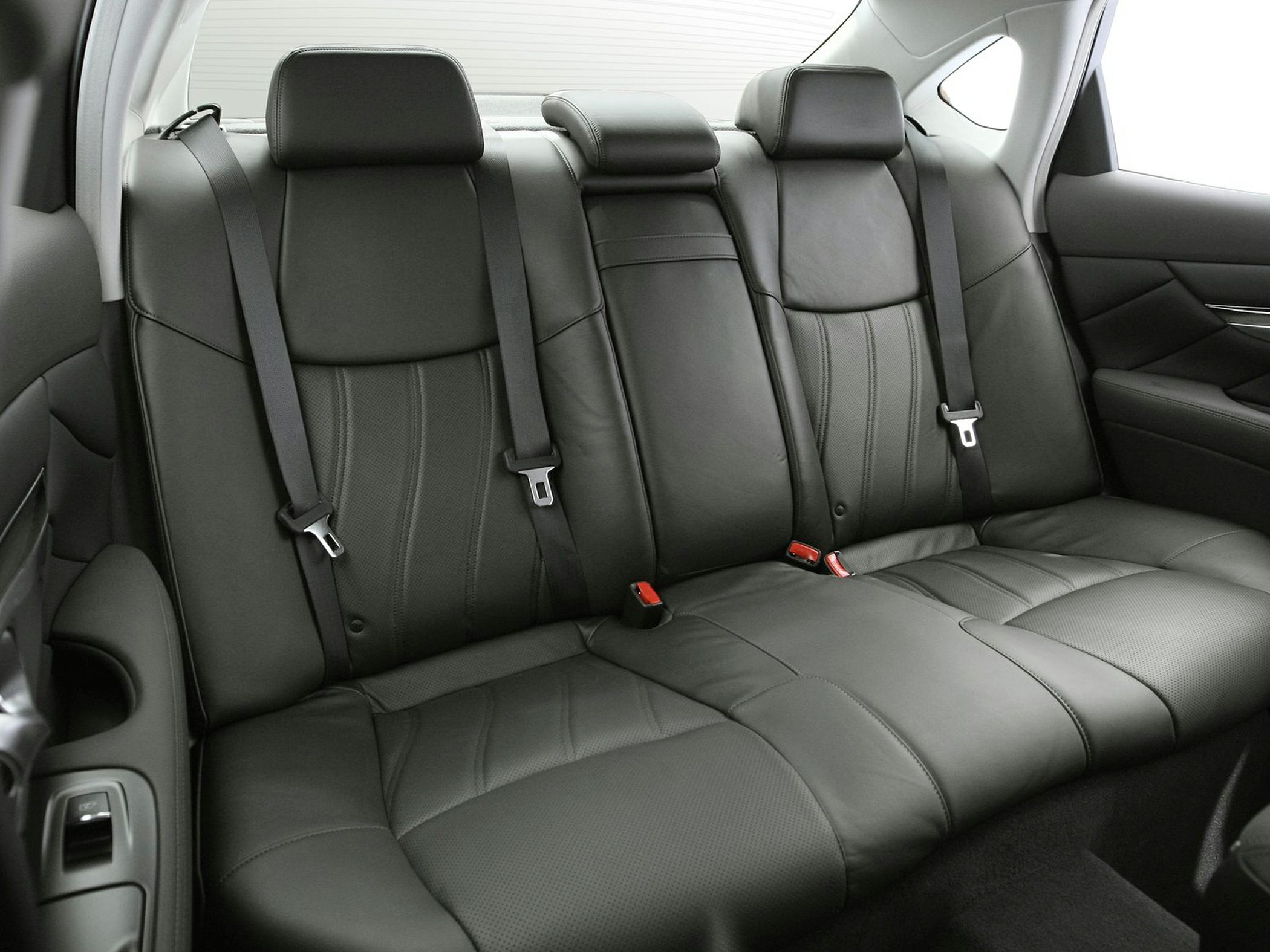 Rear leather seats with headrests and seat belts