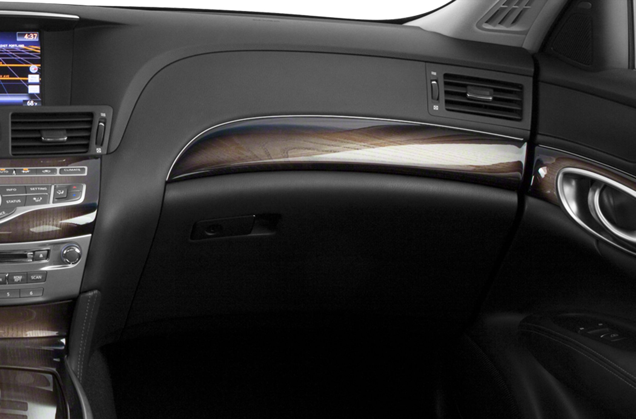 Wood trim dashboard and advanced control panel in luxury car interior
