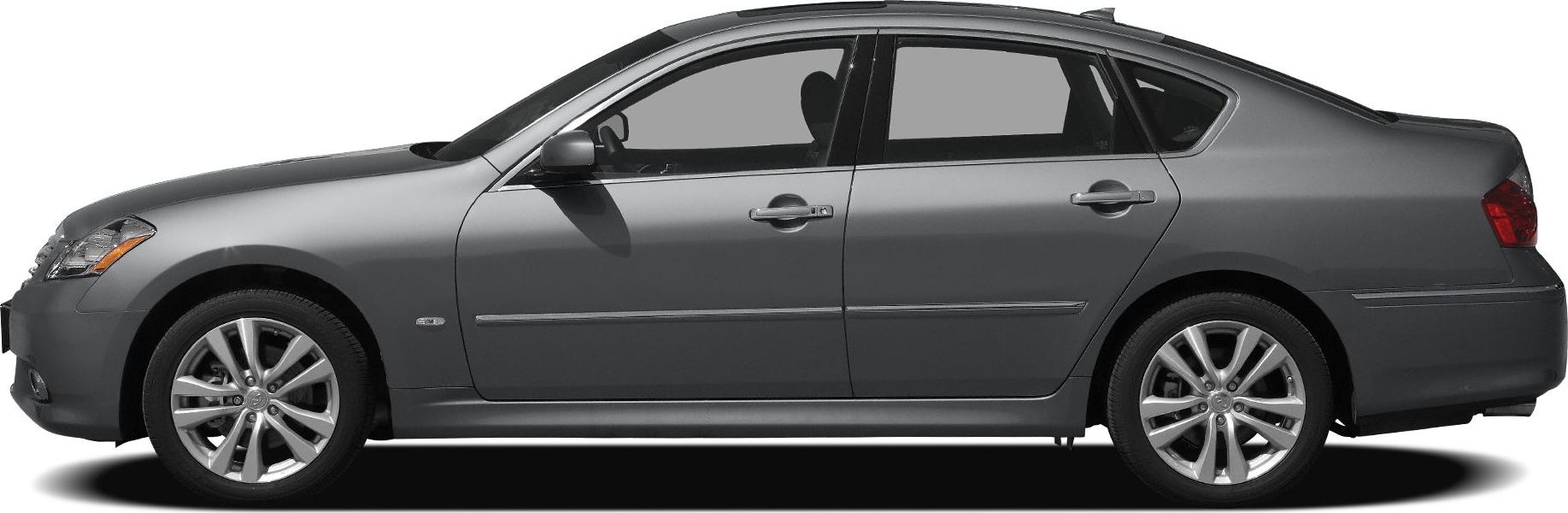Side profile of sedan with alloy wheels and sleek body lines