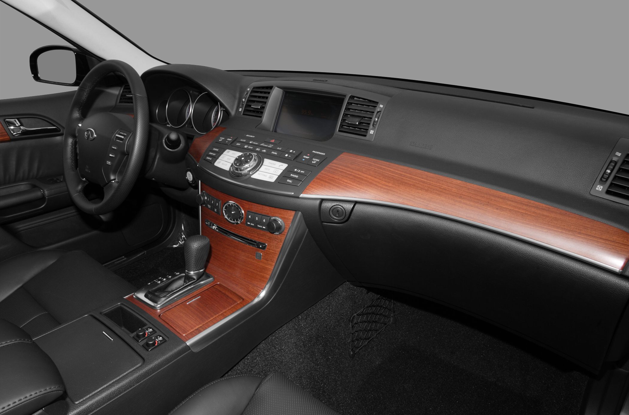 Luxury interior with wood trim and infotainment controls