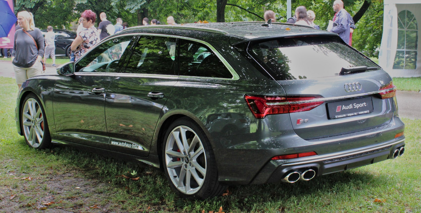 Rear side view with quad exhaust and sporty alloy wheels