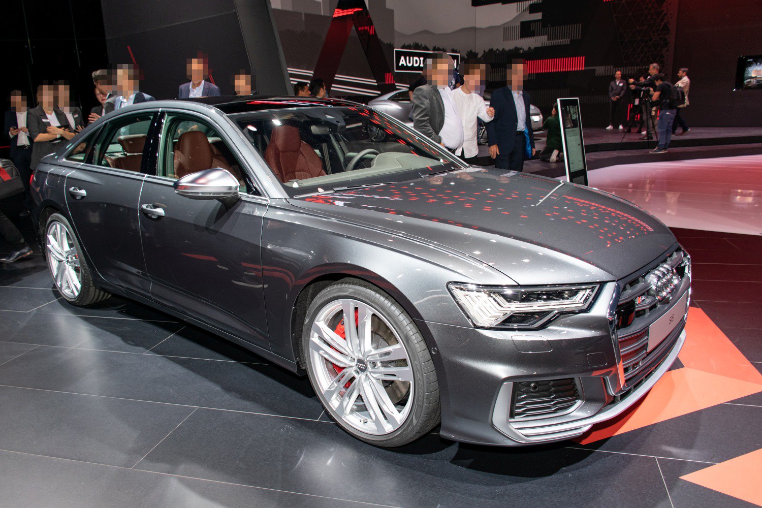 Sharp LED headlights and sporty alloy wheels on a luxury sedan