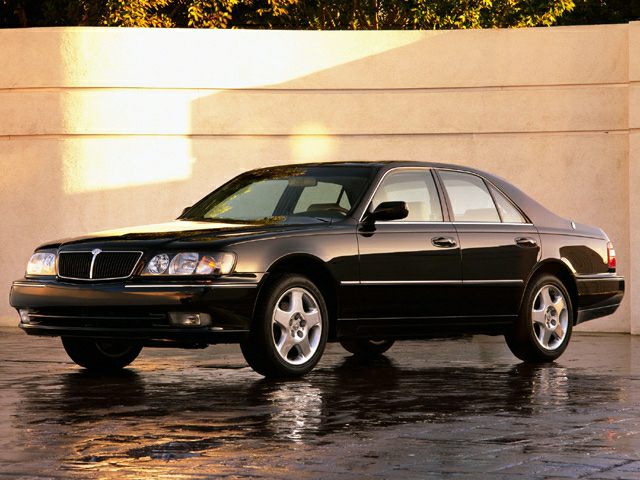 Luxury sedan with alloy wheels, rectangular headlights, and sleek body lines