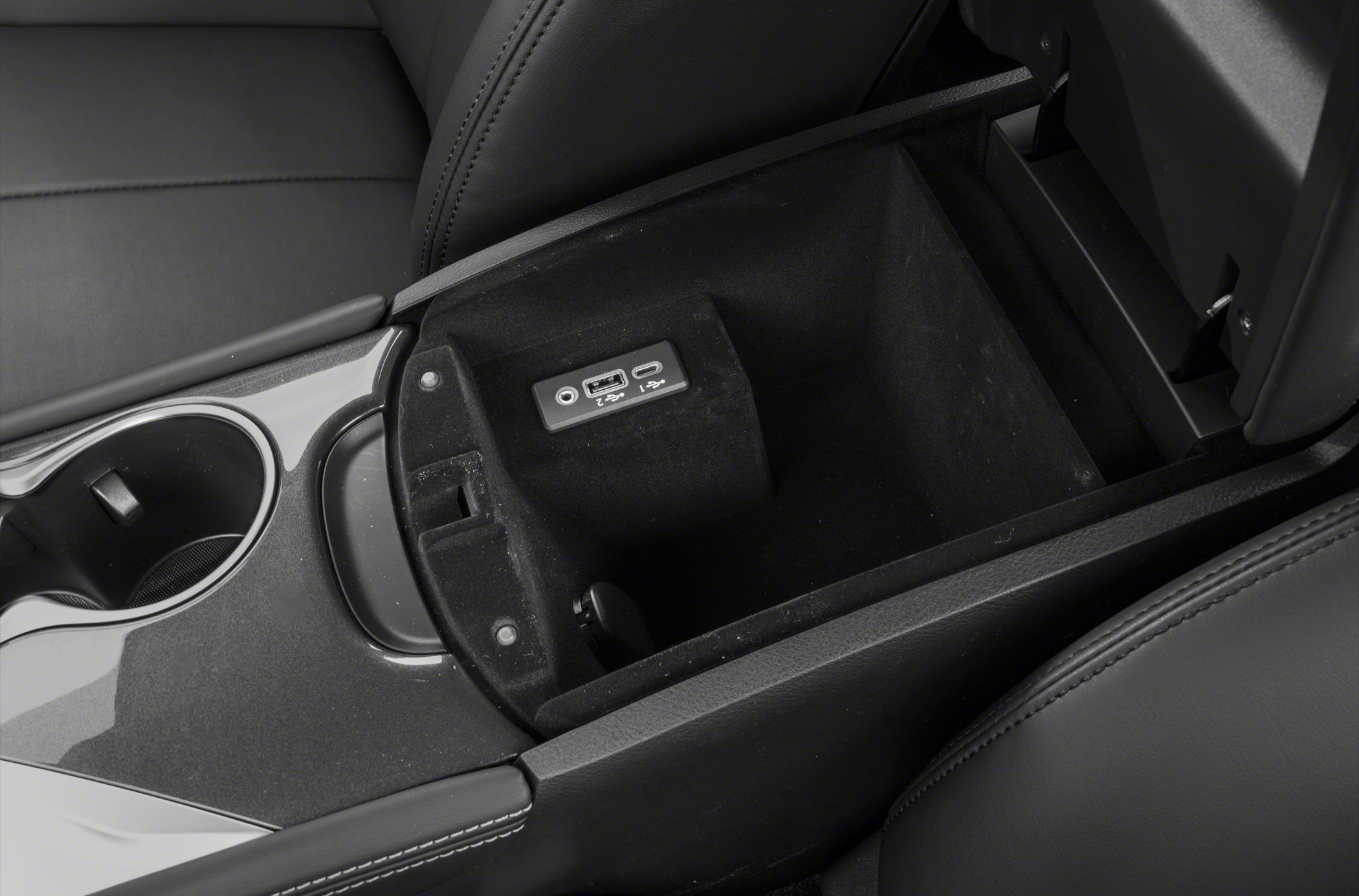Center console storage with USB and AUX ports