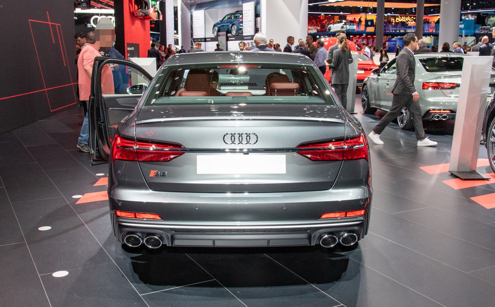 Rear view with LED taillights, quad exhausts, dark gray finish