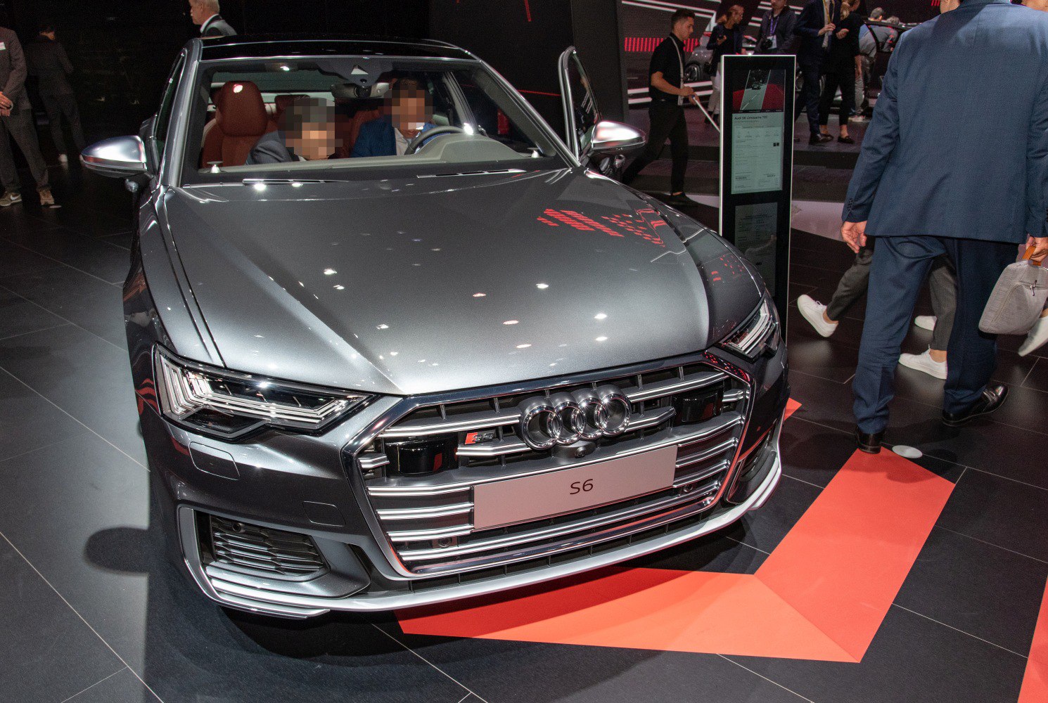Front view with LED headlights and prominent chrome grille