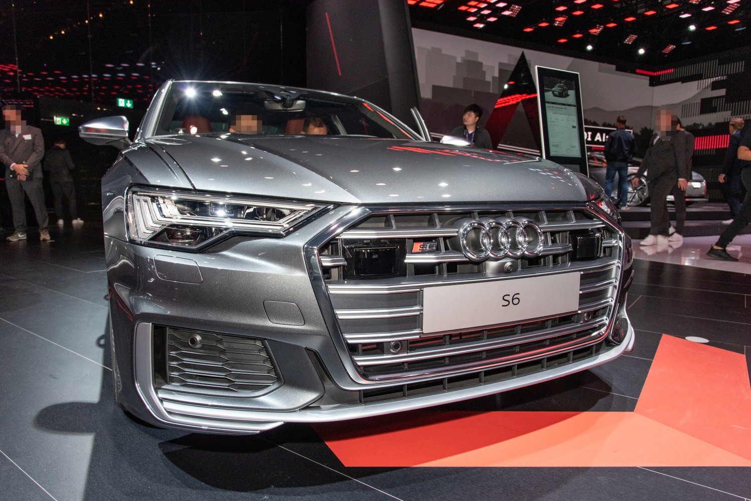 Front grille and advanced LED headlights of a luxury sport sedan.