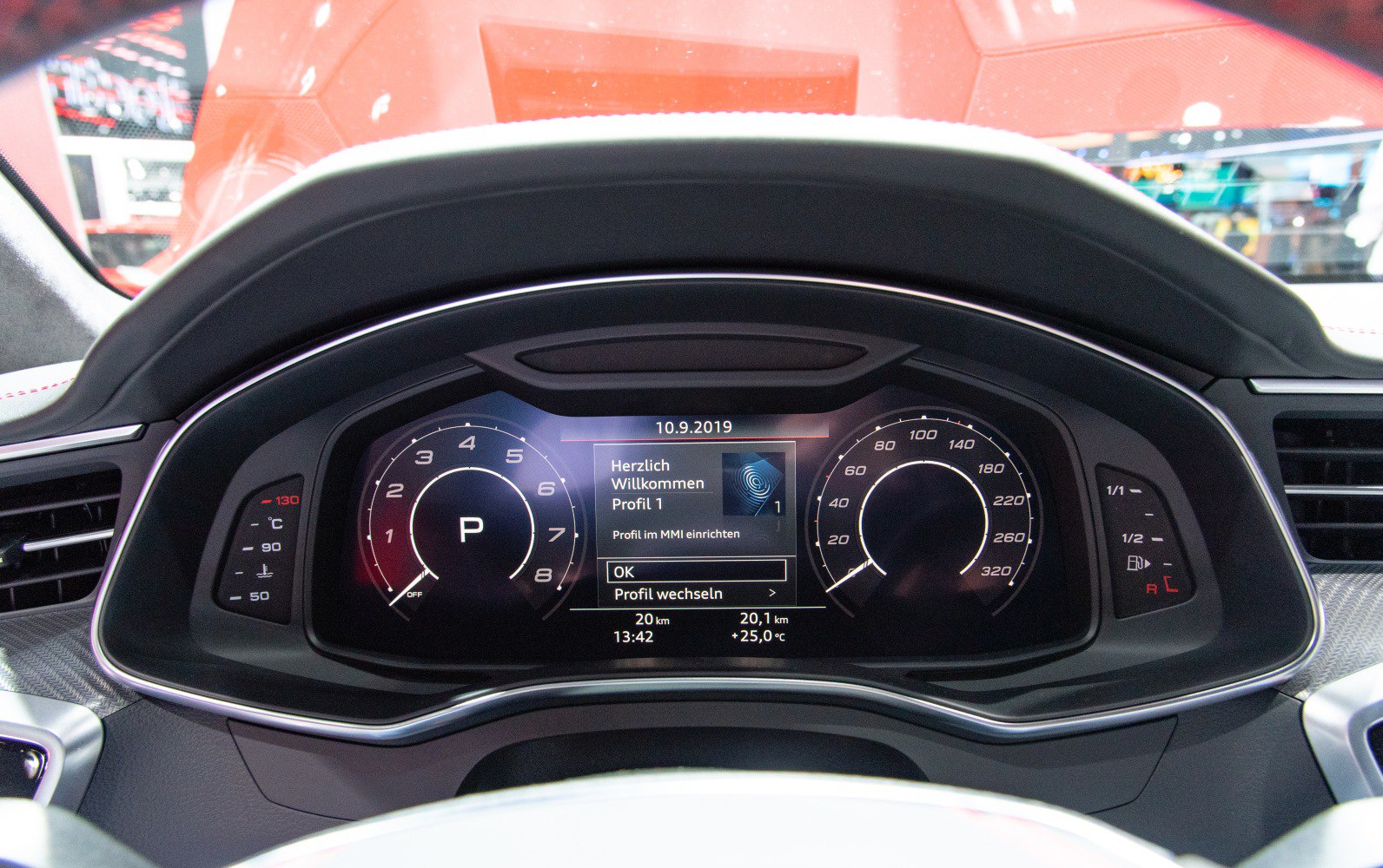 Digital instrument cluster with speedometer and tachometer