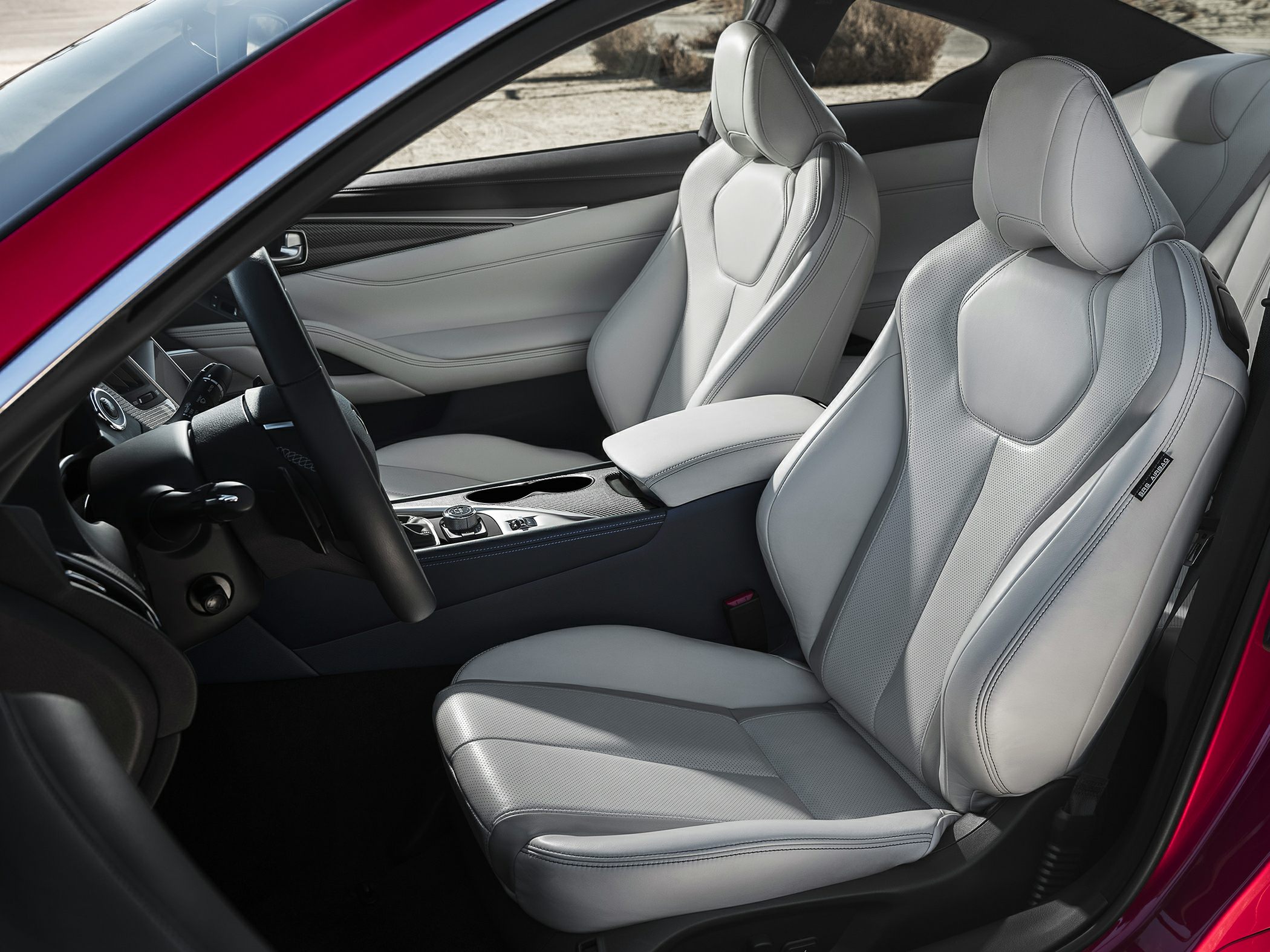 Premium leather seats and ergonomic dashboard in a luxury coupe interior