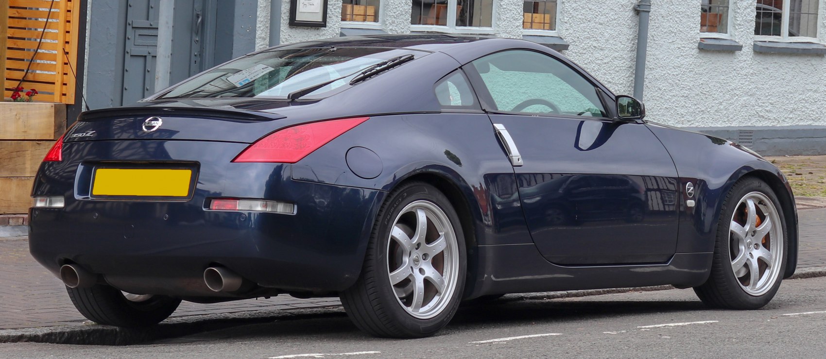 Rear and side profile with sporty alloy wheels and signature tail lights