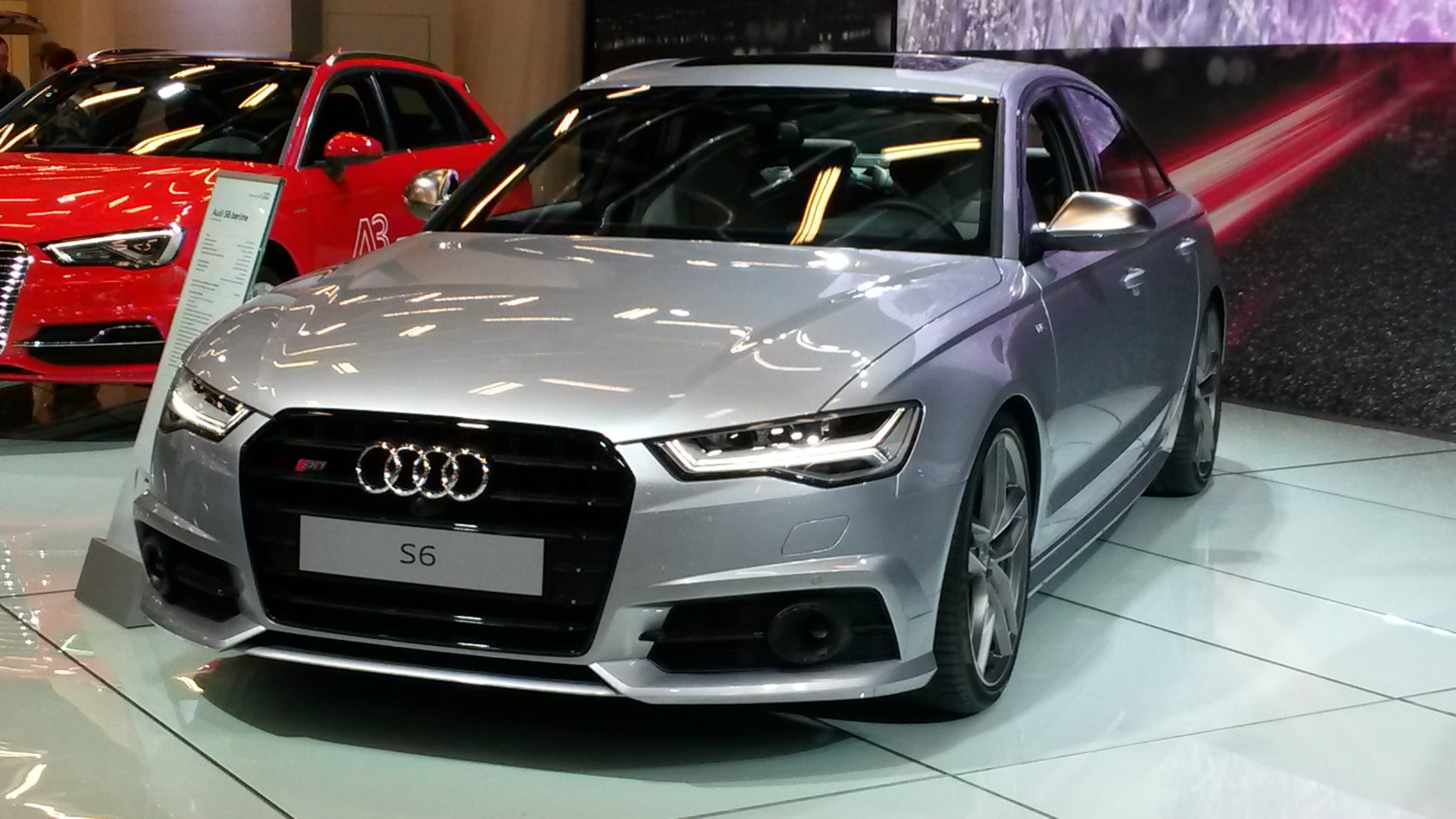 Front view with LED headlights and black grille