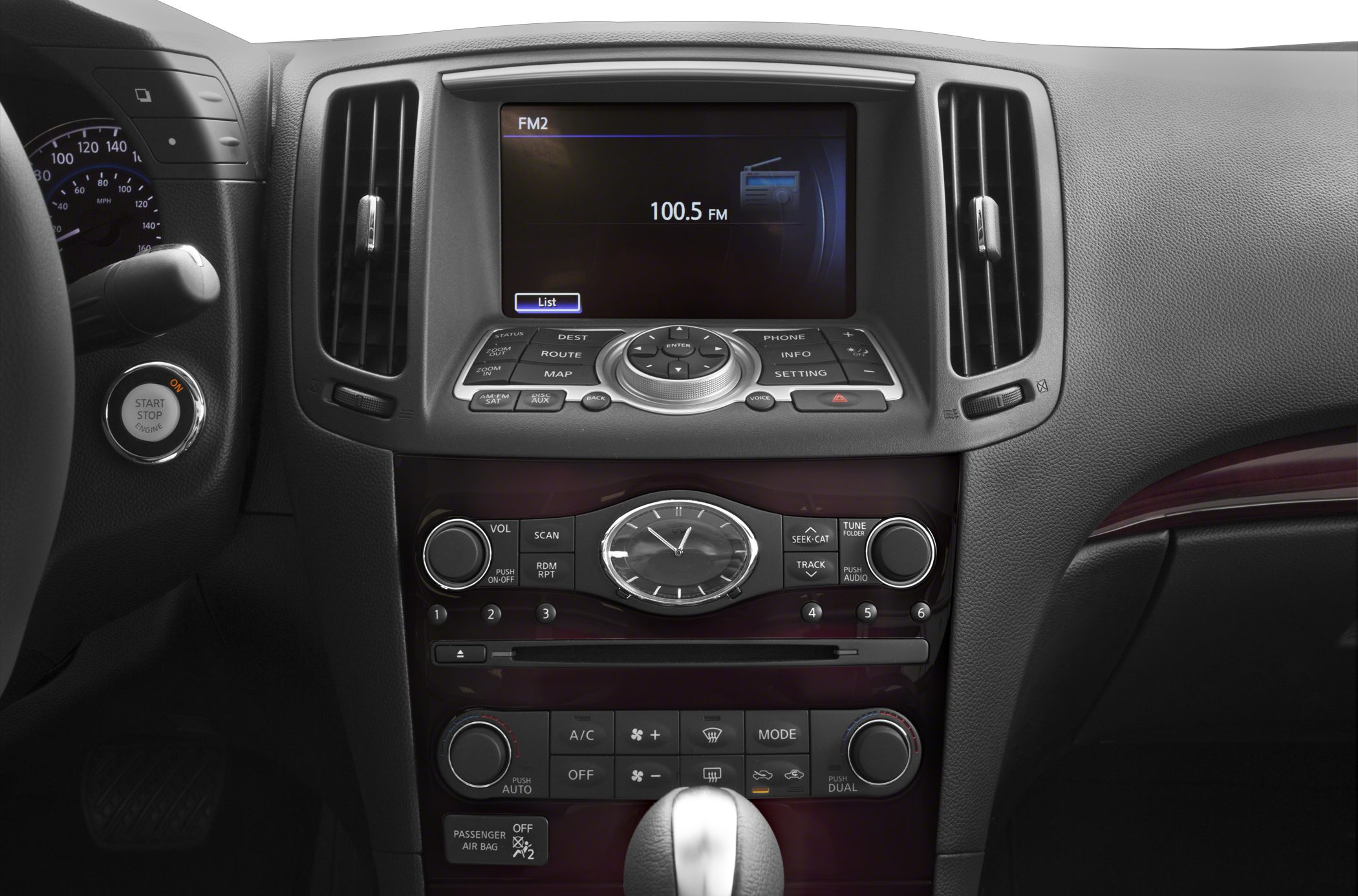 Infotainment screen, analog clock, dual-zone climate controls