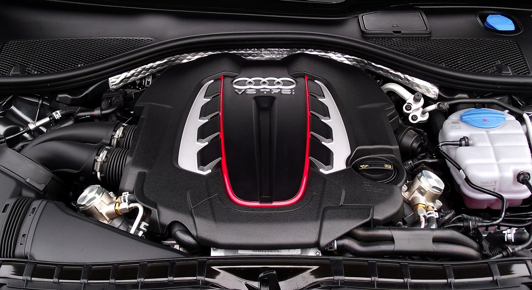Close-up of a V8 TFSI engine with detailed components and layout