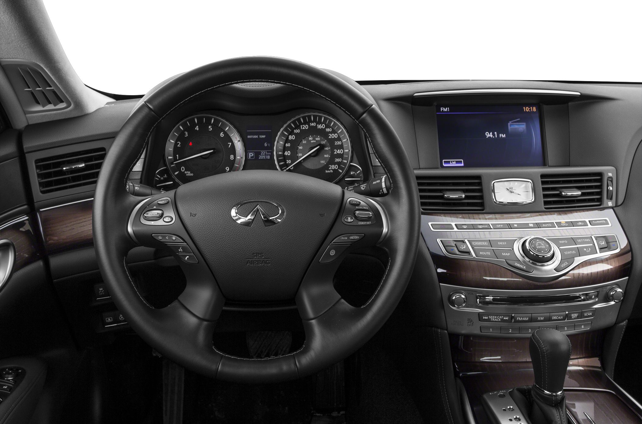 Steering wheel, instrument cluster, and center multimedia console with wood trim