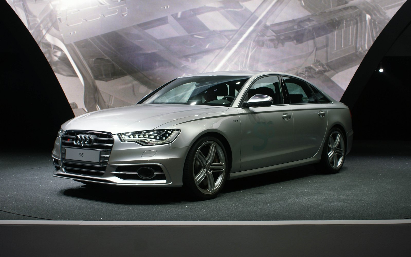 Silver sedan with LED headlights and sporty alloy wheels