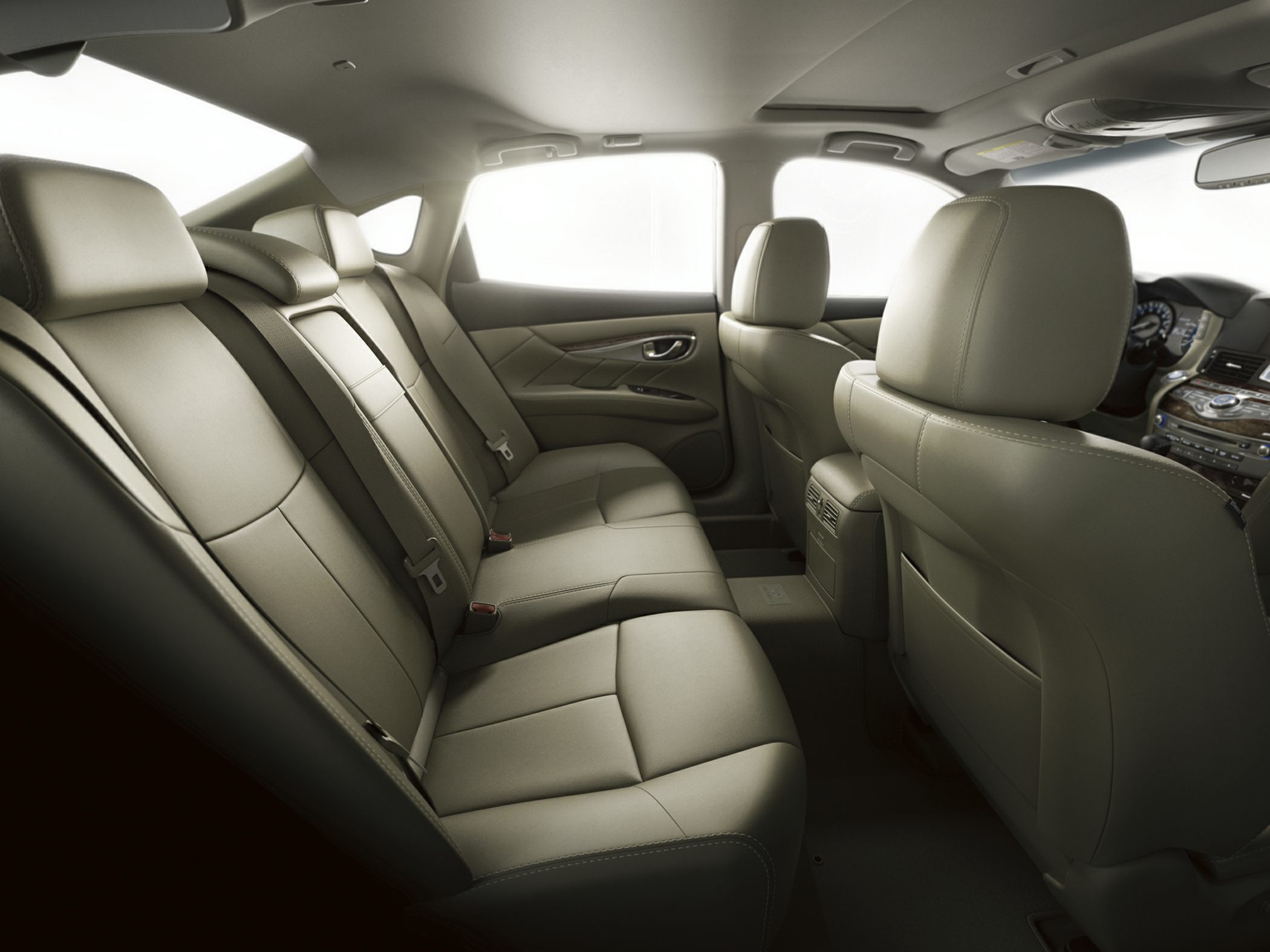 Spacious leather rear seating with elegant stitching and comfort features
