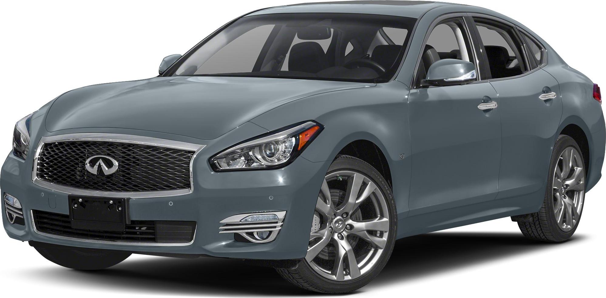 Front grille, sleek headlights, alloy wheels of a luxury sedan facelift.