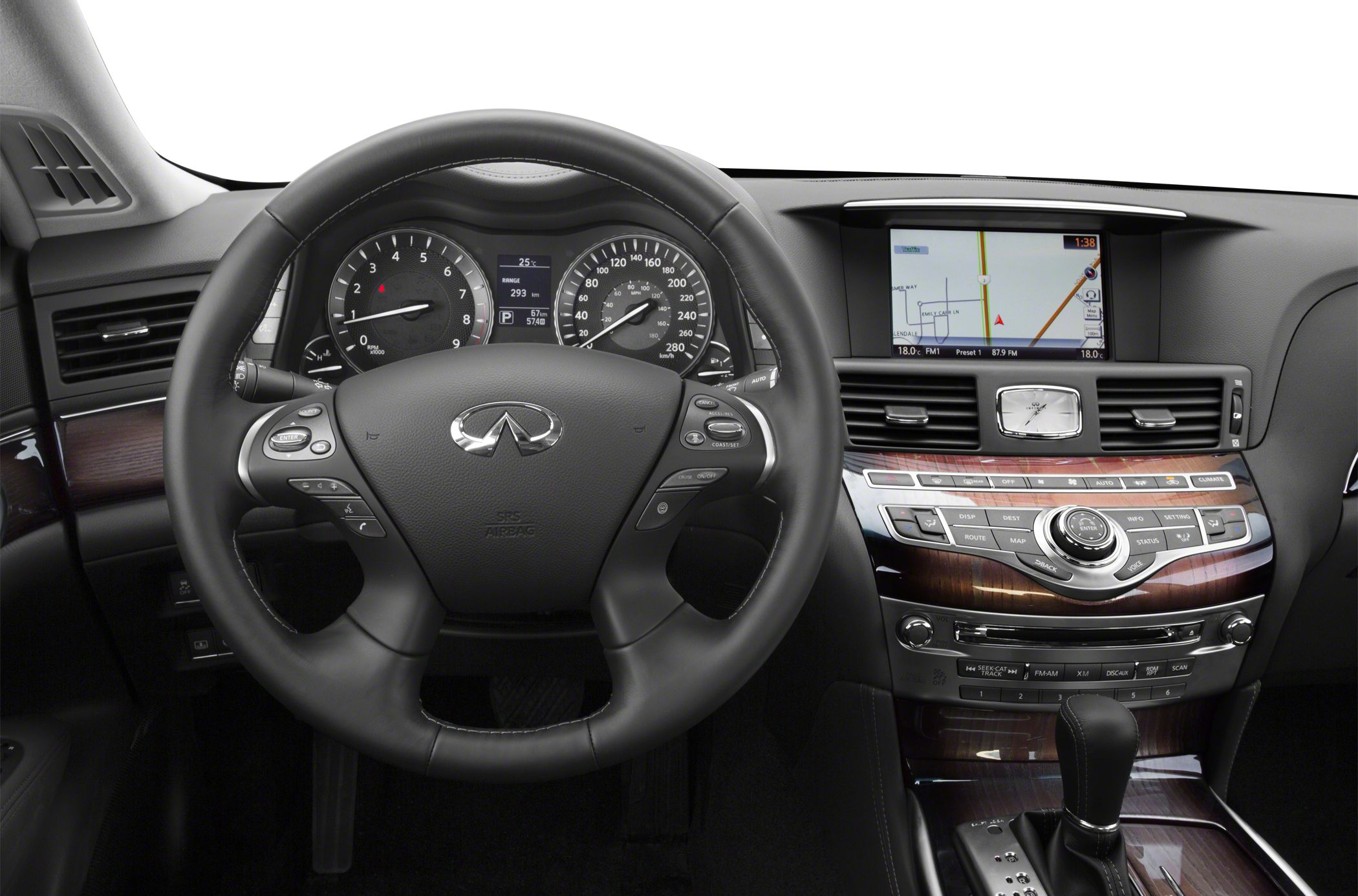 Dashboard, steering wheel with controls, navigation screen, wood grain trim