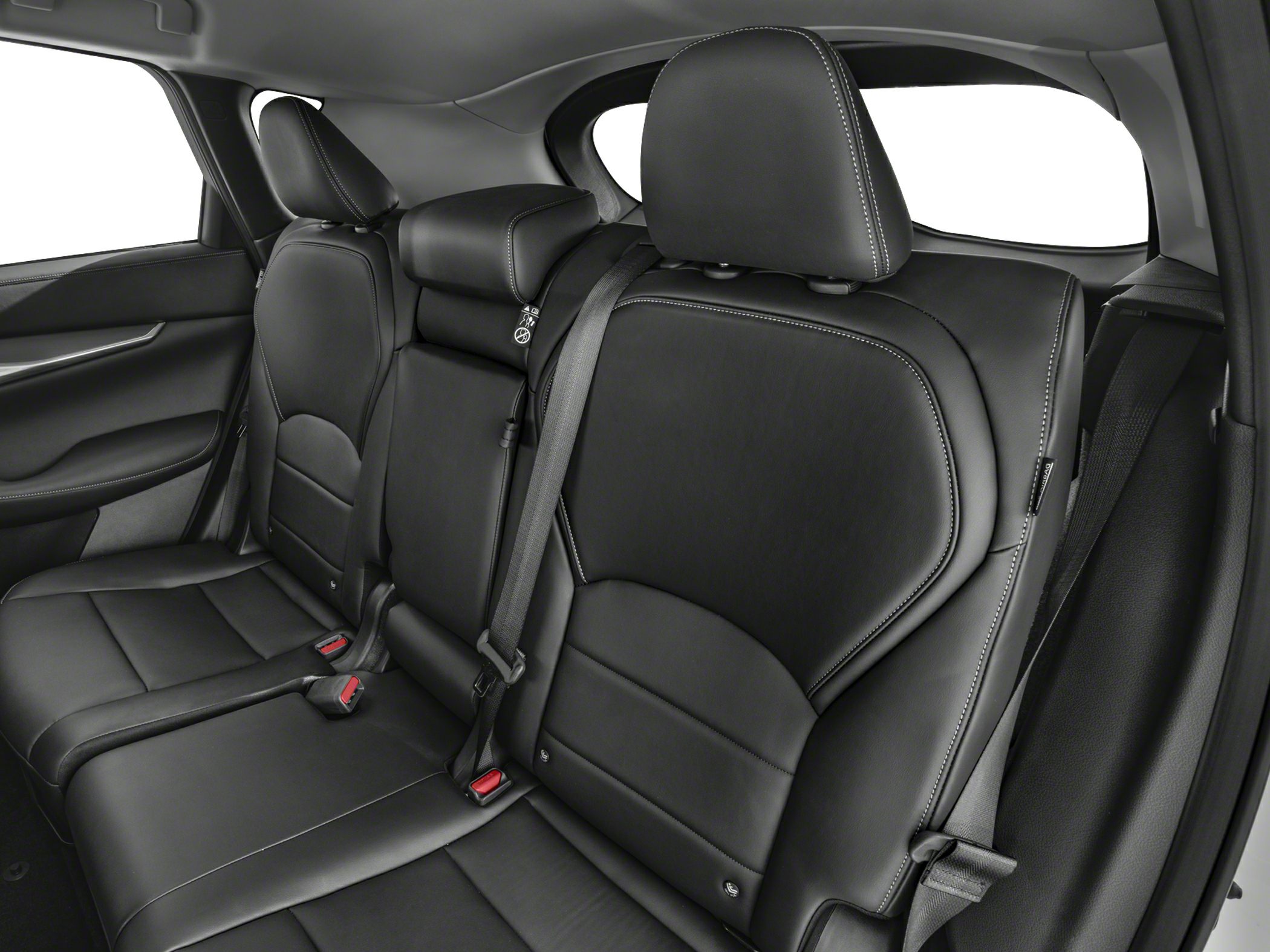 Rear seat interior with black leather upholstery and headrests.