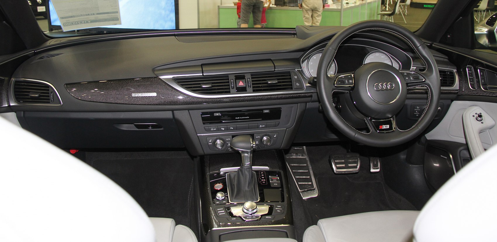 High-end dashboard with multimedia and leather steering wheel
