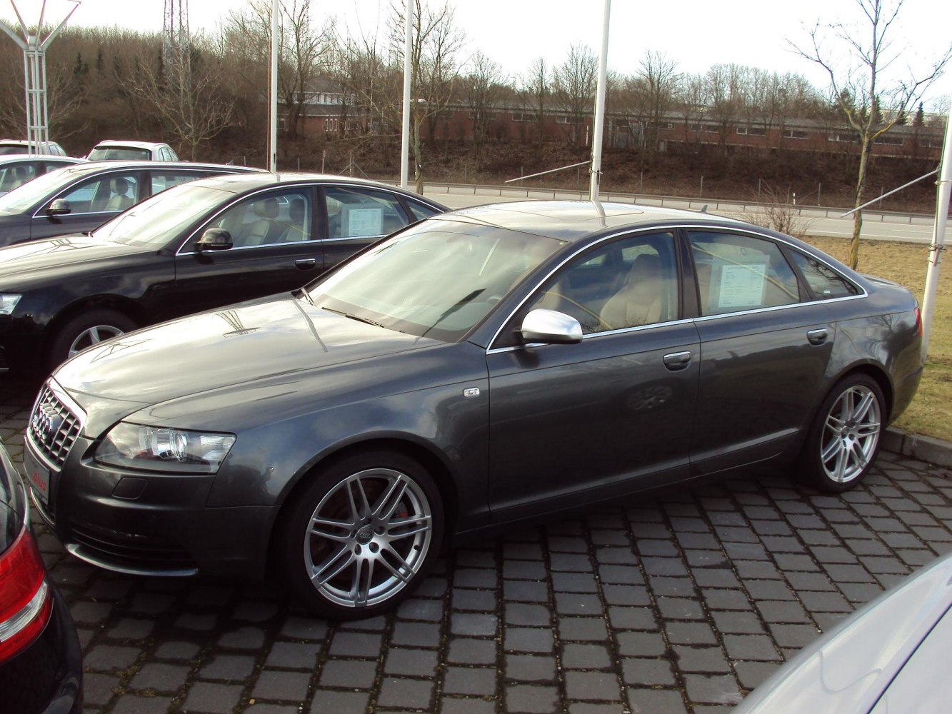 Executive sedan with sporty alloy wheels and sleek modern design
