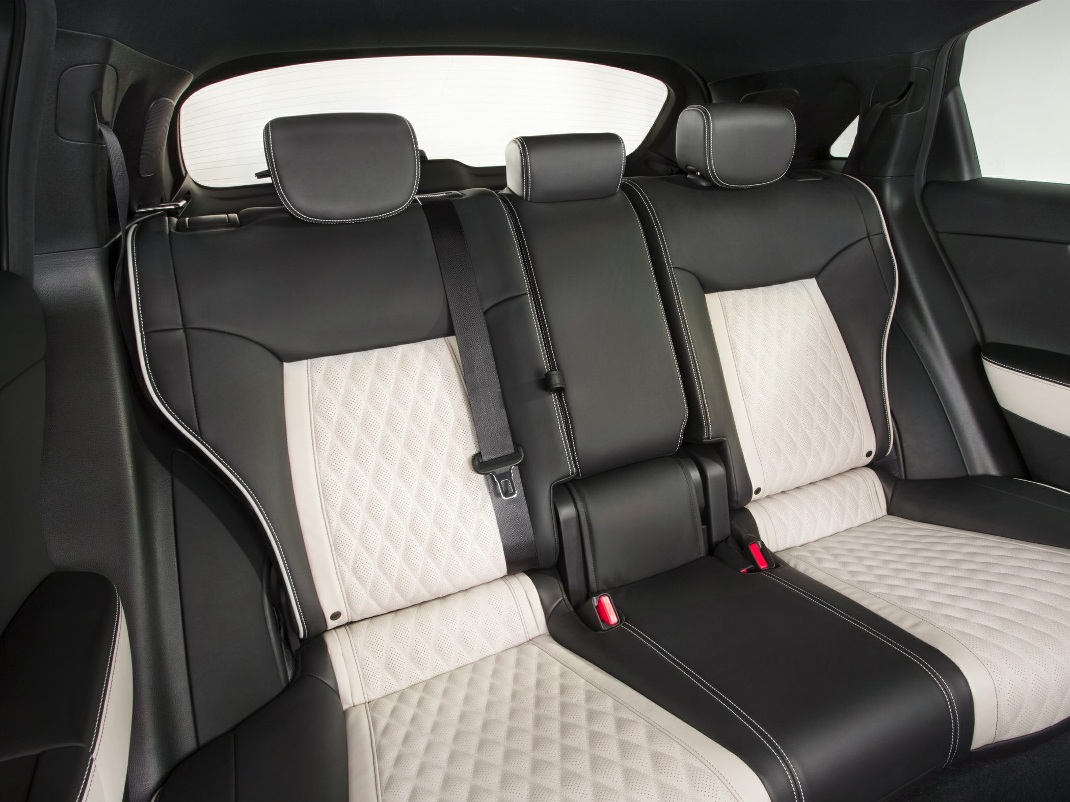 Two-tone leather rear seats with quilted pattern and headrests