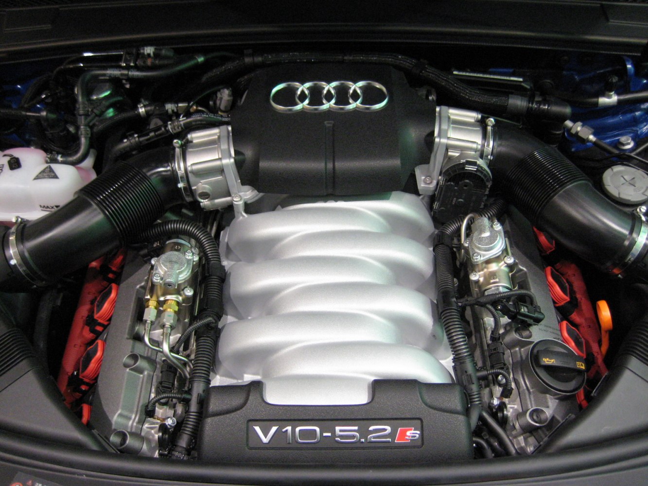 Close-up of a 5.2-liter V10 engine with Audi branding