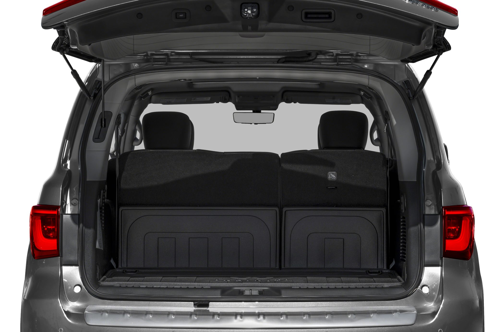 Spacious rear cargo area with open tailgate of large SUV