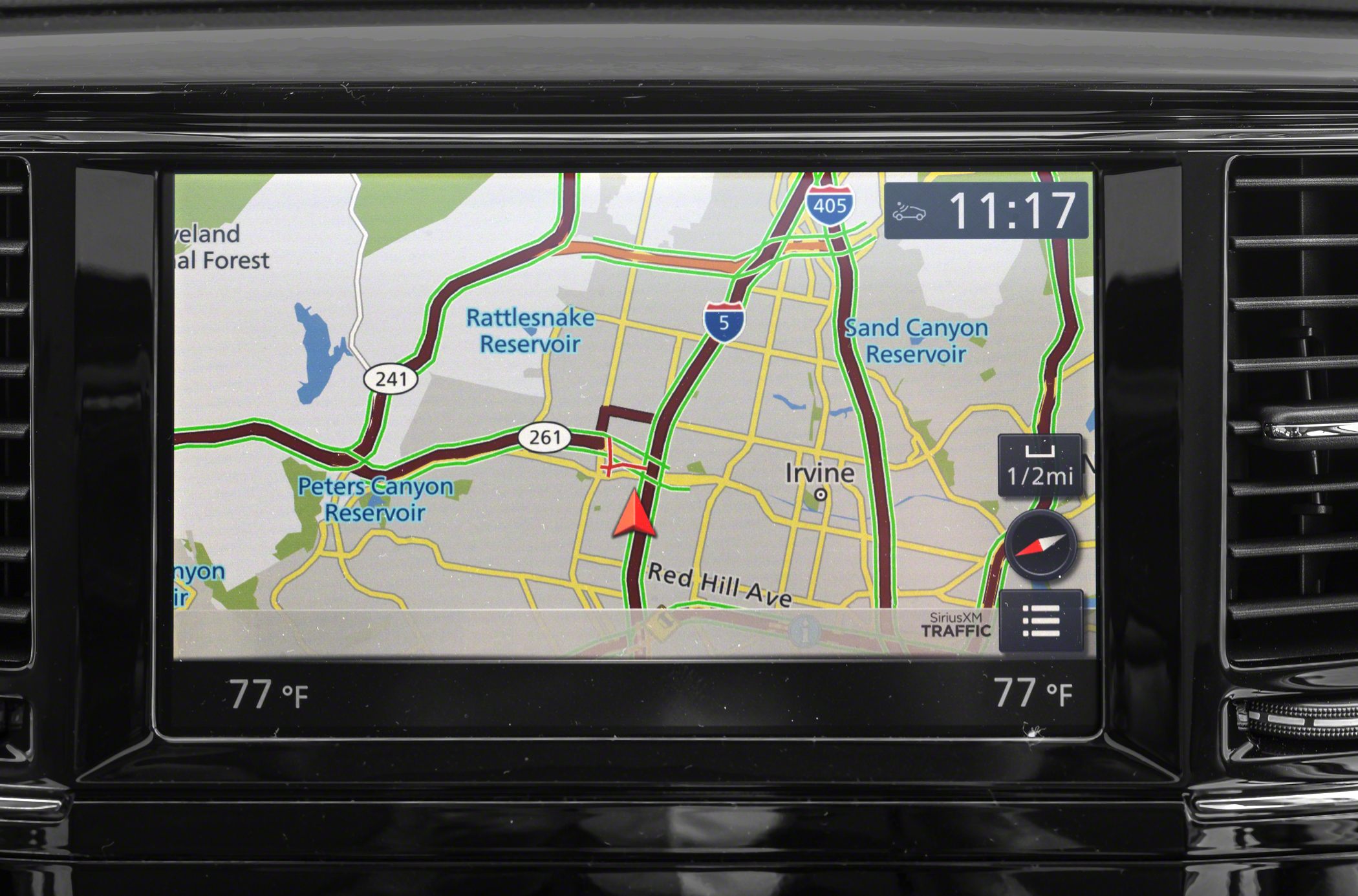 Car navigation screen and dual-zone climate control display.