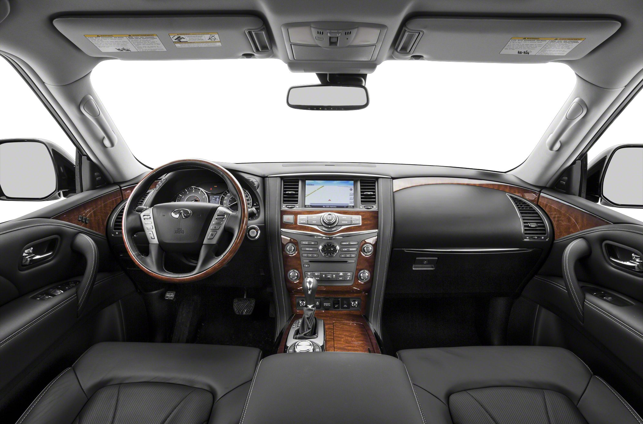 Dashboard and steering wheel with wood accents and leather trim