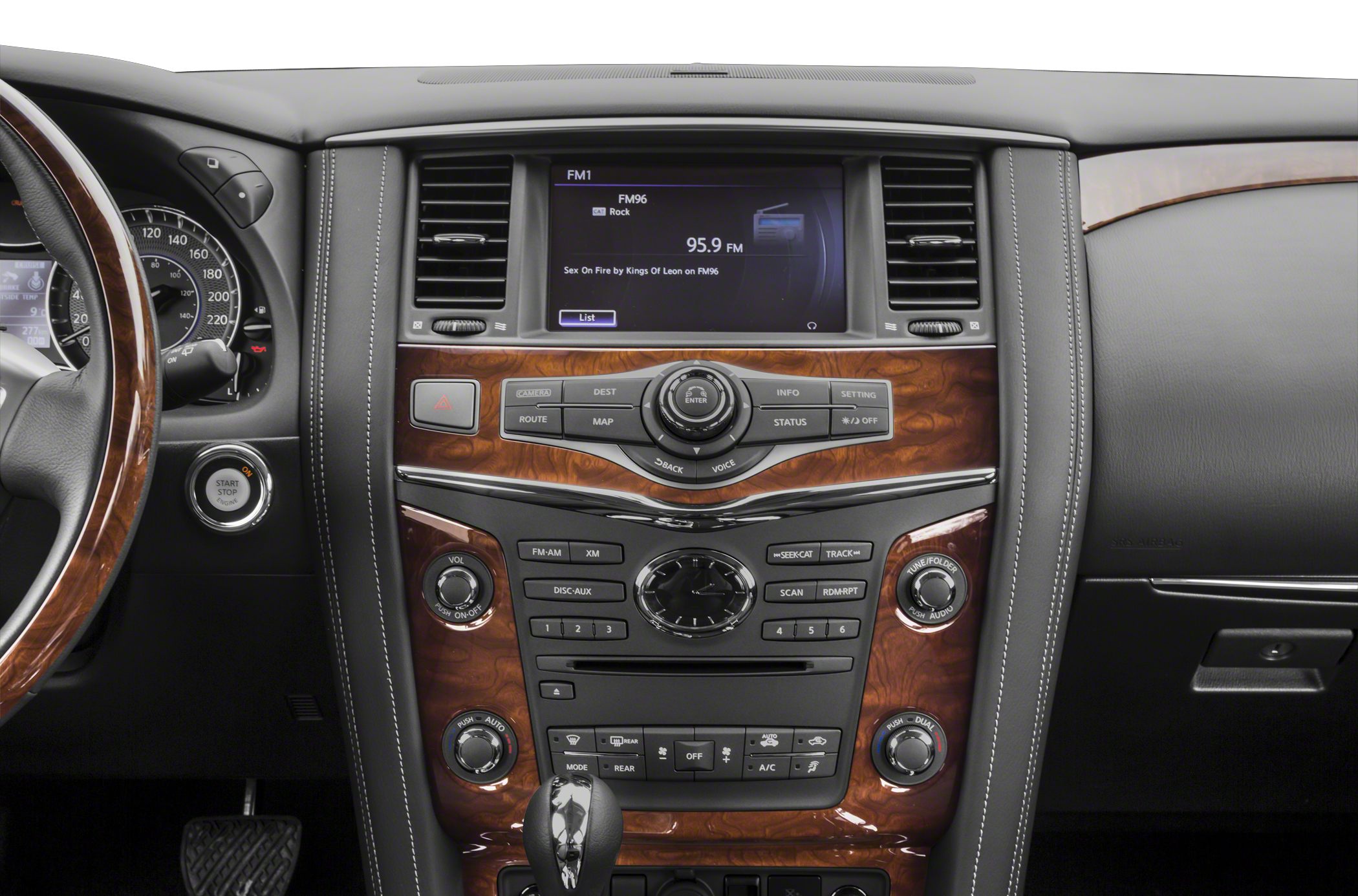 Woodgrain center console with multimedia controls and digital dashboard display