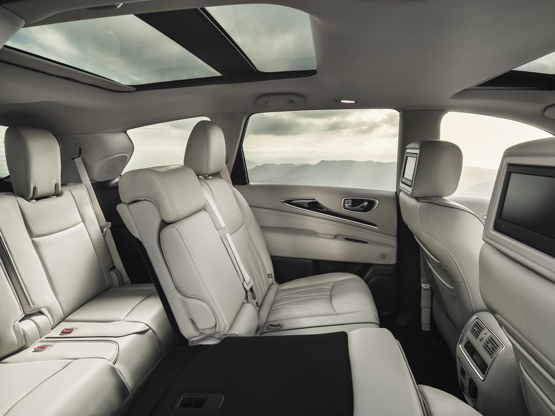 Spacious light leather interior with panoramic sunroof and rear entertainment screens