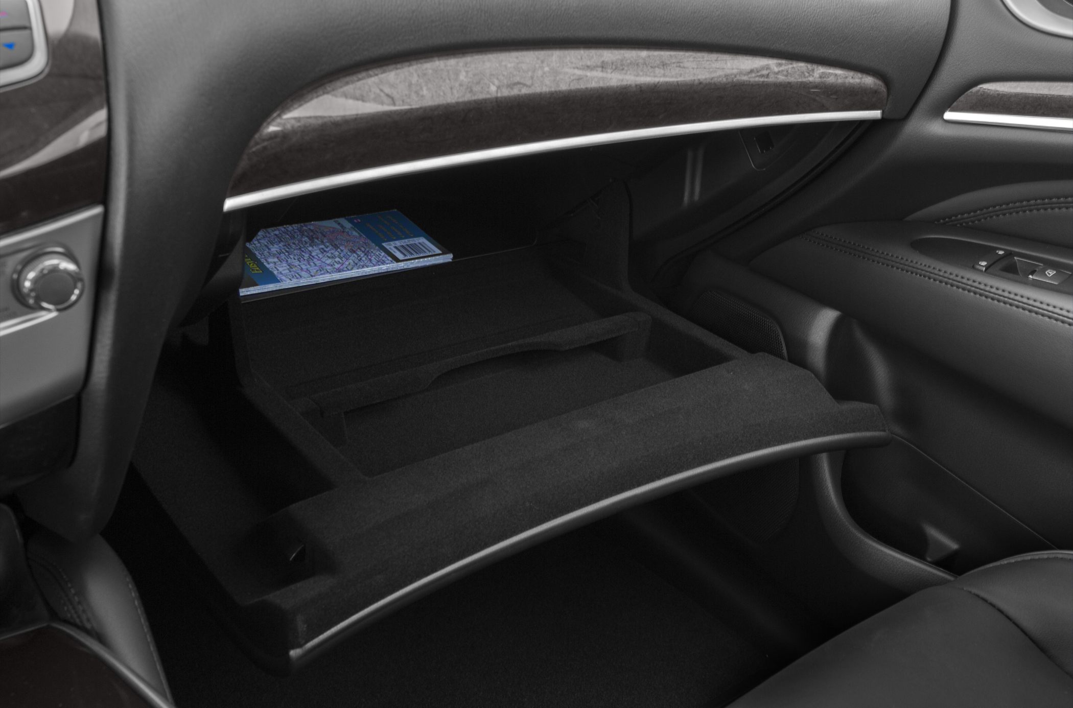 Spacious, premium-finished glove box compartment