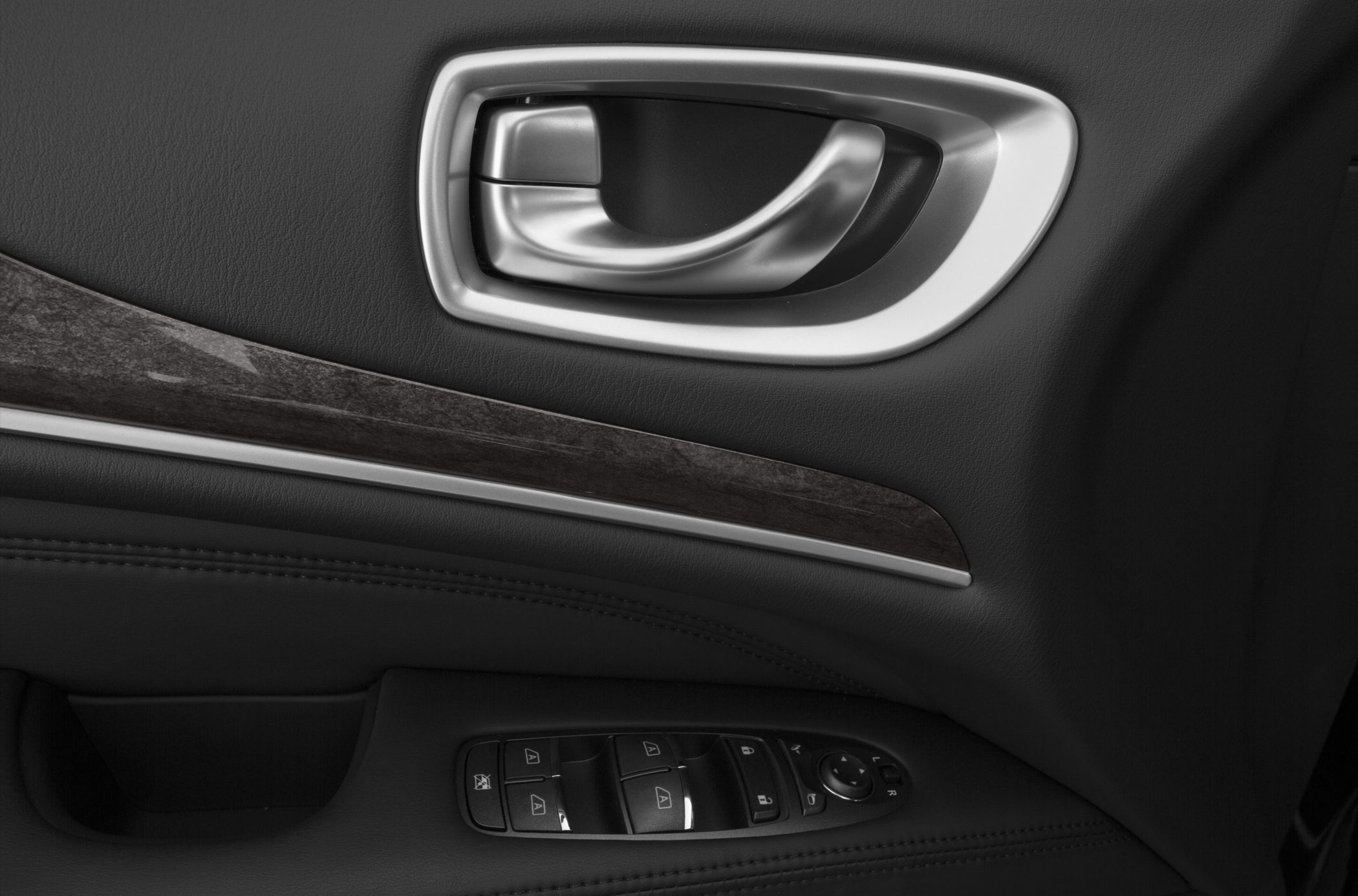 Interior door handle with control panel and window buttons