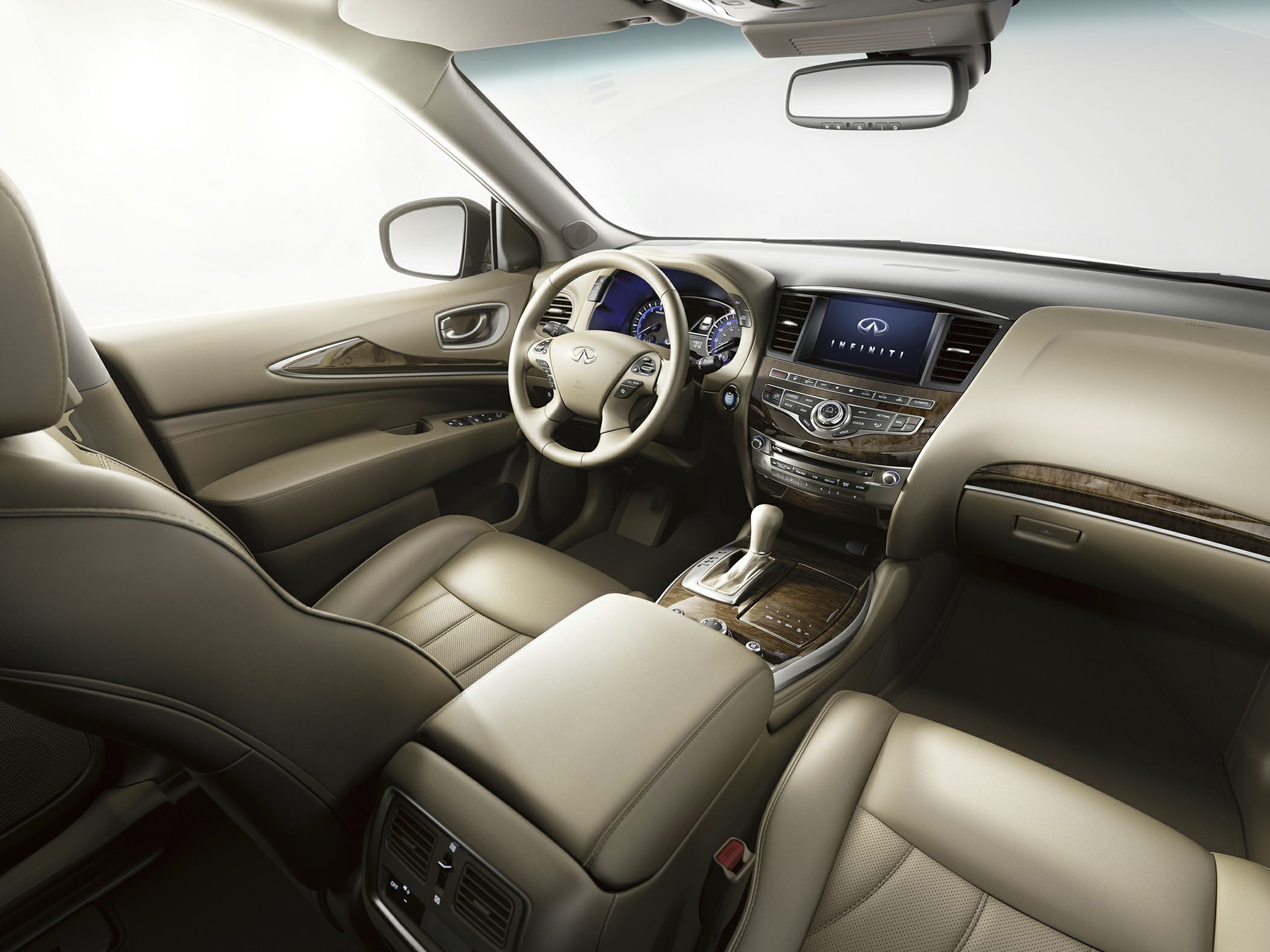 Luxury beige leather interior with wood trim and advanced infotainment system