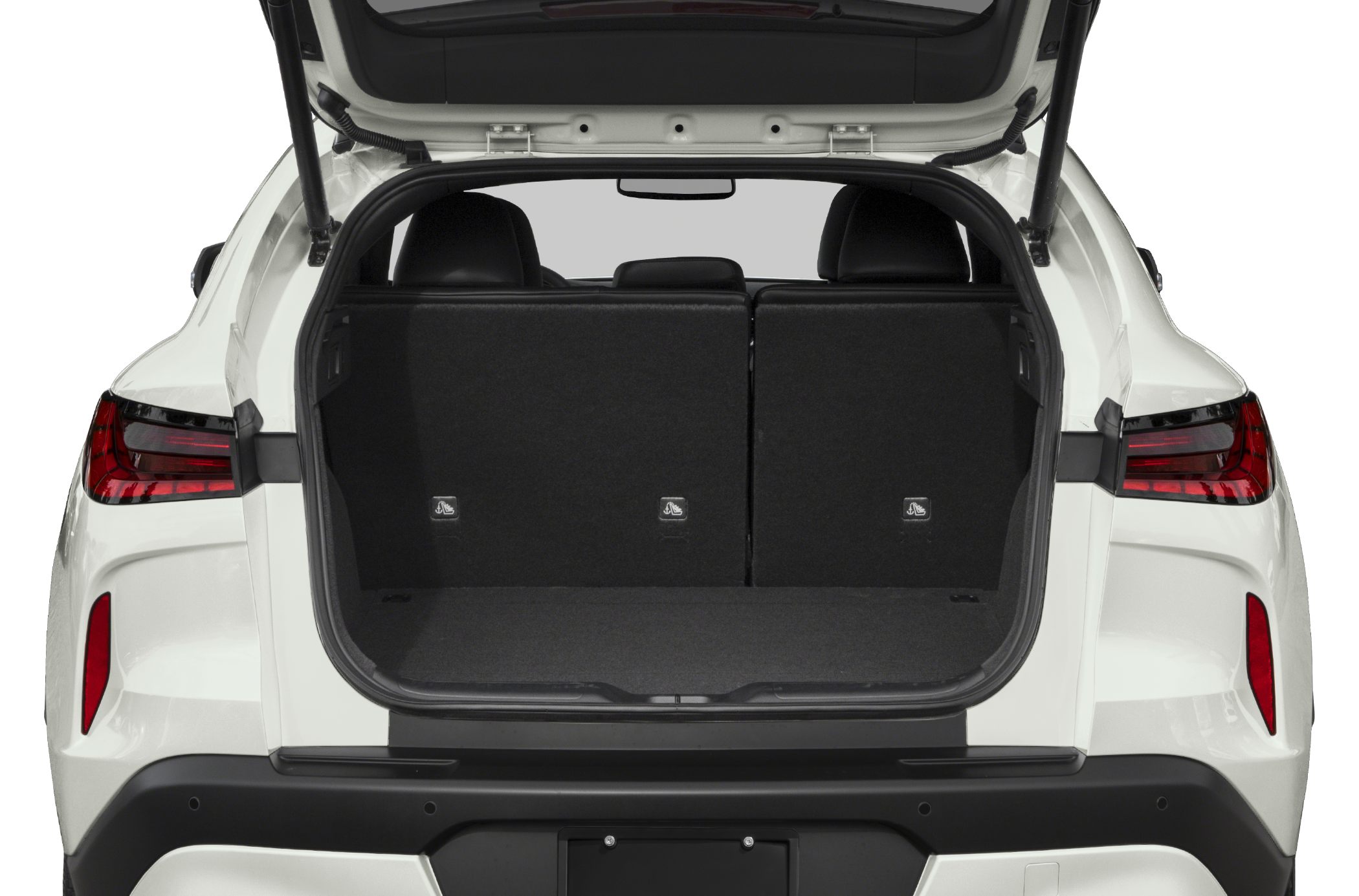 Open rear trunk showing spacious cargo area with split rear seats.