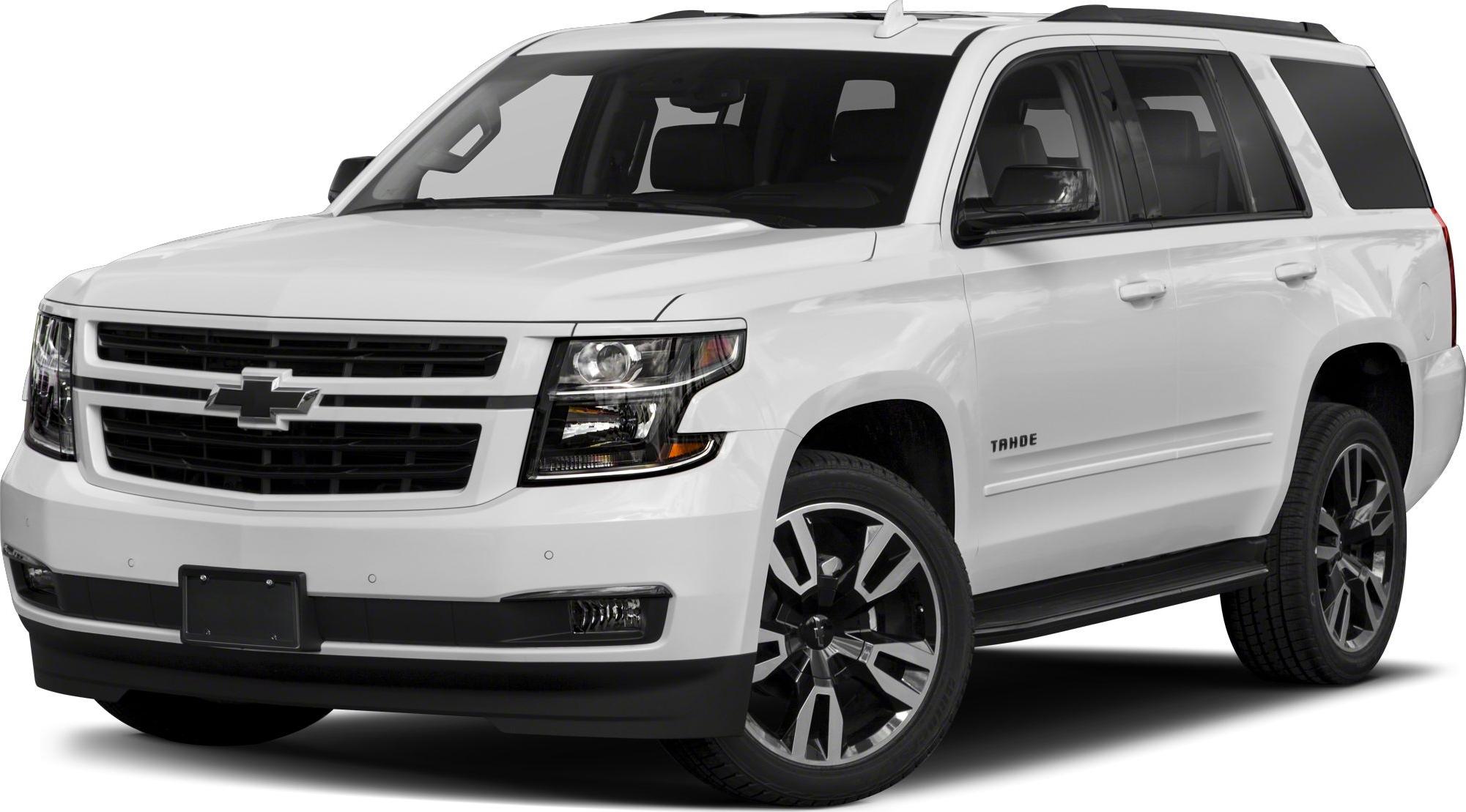 White full-size SUV with LED headlights and alloy wheels