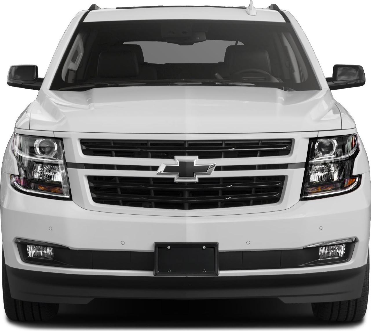 Front view with LED headlights and bold grille on large SUV.