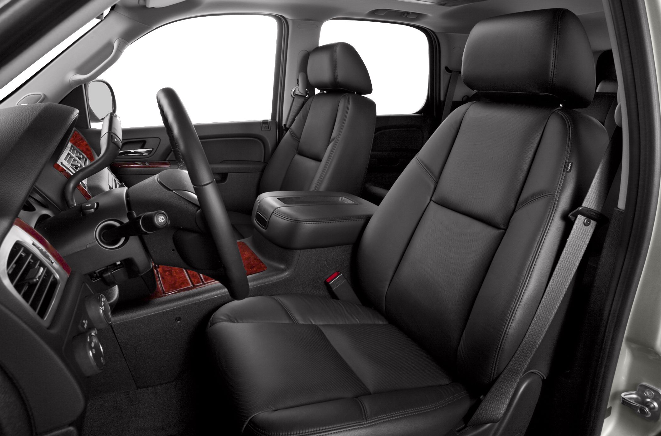 Black leather front seats with wood trim details