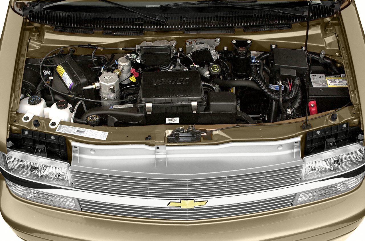 Close-up of Vortec engine and front grille inside hood compartment